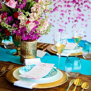 Turquoise and purple and gold wedding tablescape
