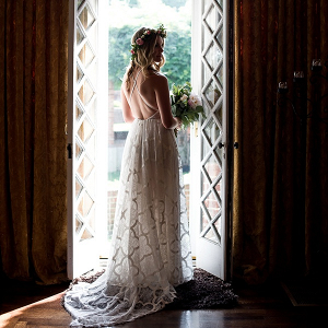 Bride portrait in window