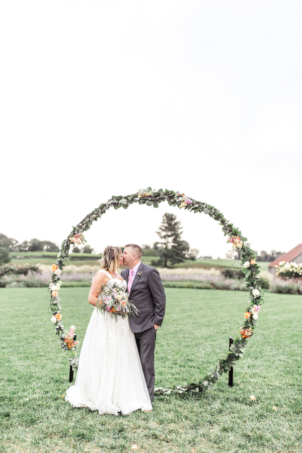 ceremony arch ring floral design