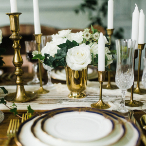 gold and white weding reception table