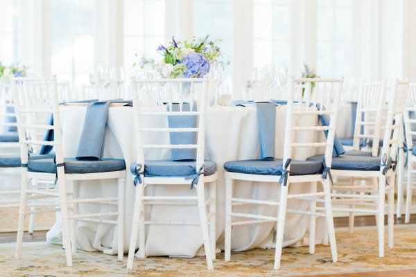 White Tables with Low Textured Centerpiece and Water Blue Accents
