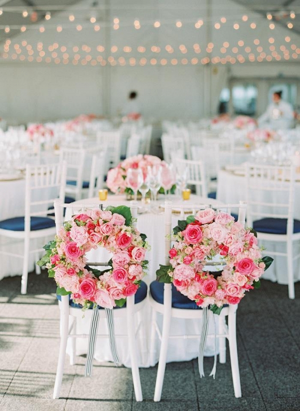 flower wreath bride and groom chairs