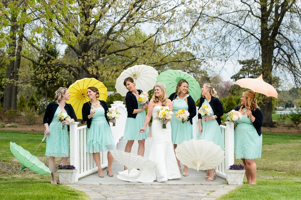 rainy day bridesmaid portrait session with colorful umbrells